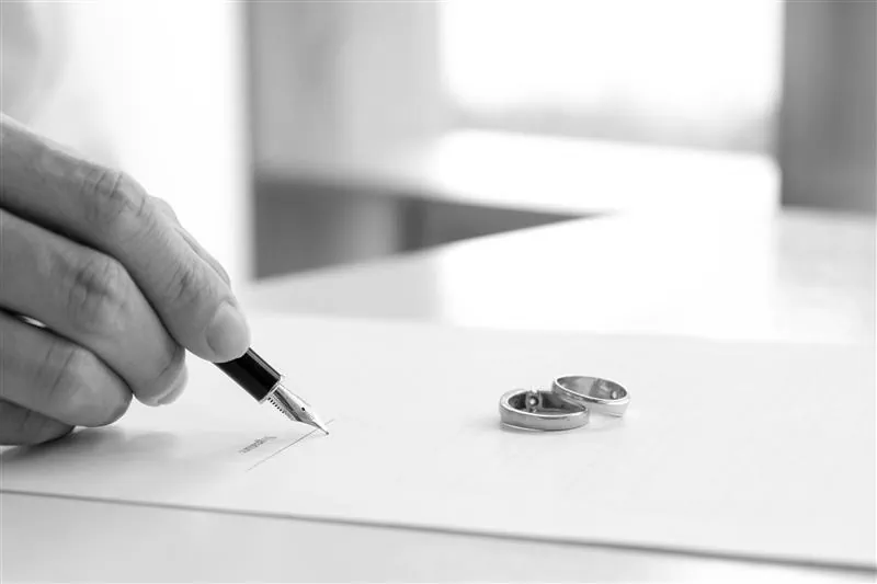 Wedding rings on divorce papers being signed — Split podcast episode 8